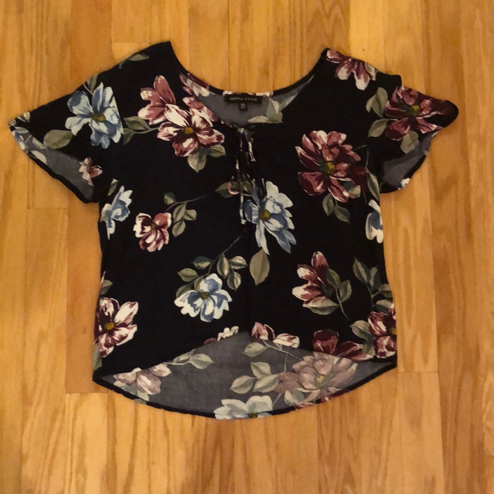 Navy floral top with a lace up front.